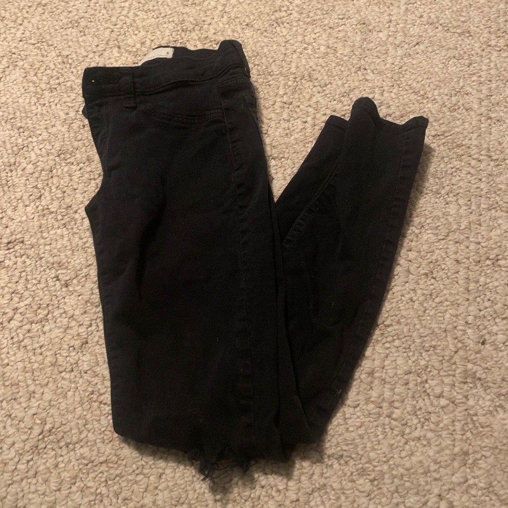 Black Jeans with rip in left knee (right in pictures)